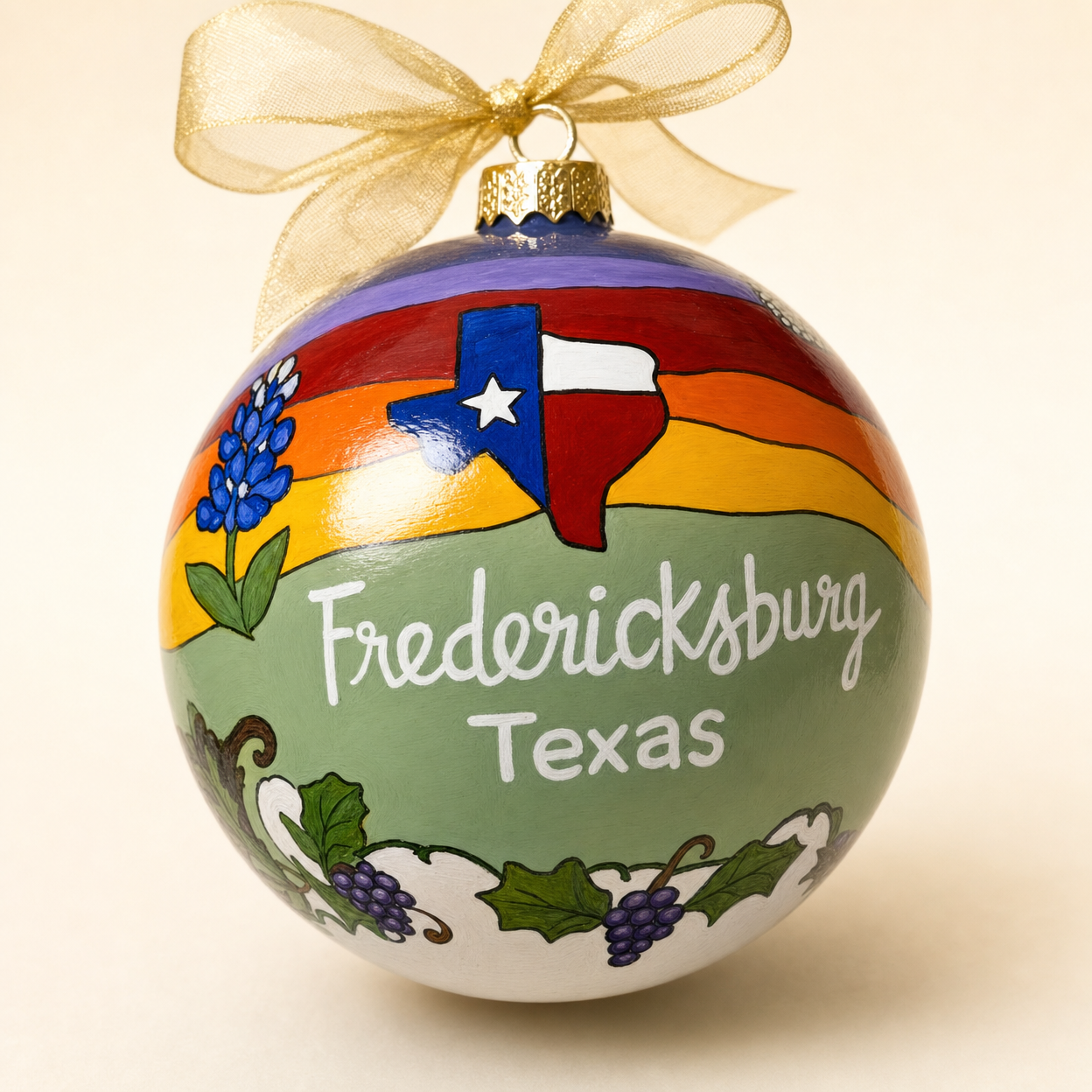 Fredericksburg Texas hand-painted glass Christmas ornament beside its CurioCity Designs keepsake gift box