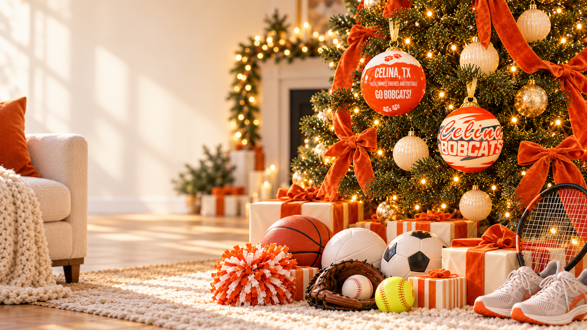 Celina Bobcats Spirit and Football Traditions glass ornaments on an orange-and-white Christmas tree.