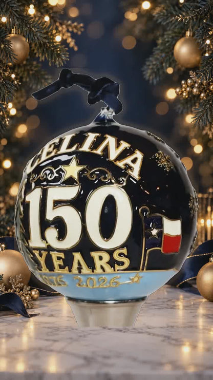 Portrait glow-enhanced rotating Celina 150th Anniversary hand-painted glass ornament for social media, shown against a luxury Christmas background.